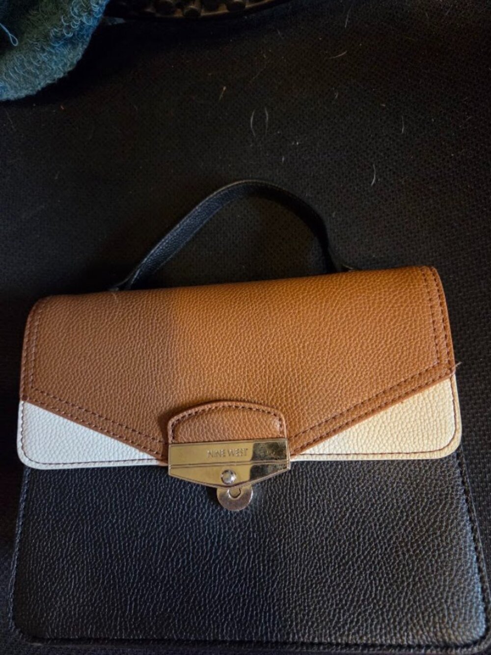 Nine West. Purse with handle. Snap front closure.
